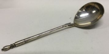 A large heavy Russian silver spoon. Approx. 66 grams. Est. £50 - £80.