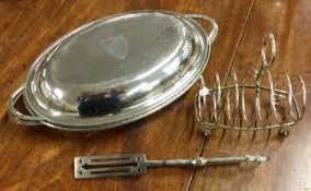 A silver plated toast rack etc. Est. £20 - £30.