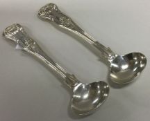 A pair of heavy Kings pattern silver salt spoons.