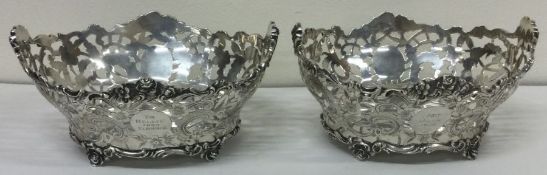 A large pair of silver pierced baskets. London 19009. By Charles Stuart Harris.