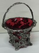 A large Victorian silver basket with red glass liner. London 1877. By Barnards.
