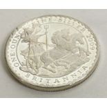 A one ounce Britannia silver coin. Approx. 31 grams. Est. £30 - £50.