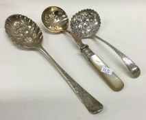 A good Georgian silver berry spoon etc. Approx. 97 grams. Est. £20 - £30.