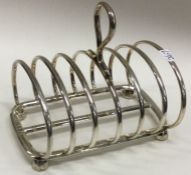 A heavy silver seven bar toast rack. Sheffield. Approx. 192 grams.