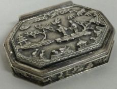 A silver snuff box with Chinoiserie decoration with unusual inscription to base.