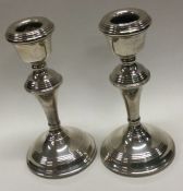 A pair of circular silver candle sticks. Birmingham. Approx. 409 grams. Est. £40 - £60.