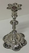 An 18th Century fine silver taperstick. London 1748. Possibly by Samuel Courtauld.