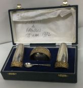 A novelty cased silver and silver gilt condiment. Birmingham 1971. By Deakin & Francis. Approx. 250