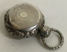 TAYLOR AND PERRY: An antique silver box pendant loop. Approx. 13 grams. Est £40 - £60.