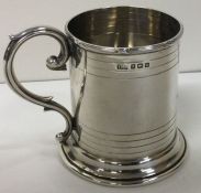 A stylish silver christening mug with reeded body. Birmingham 1911. Approx. 89 grams.