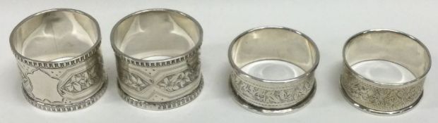 Two engraved silver napkin rings. Approx. 24 grams. Est. £15 - £20.