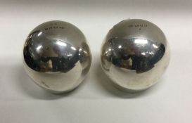 OF ROYAL INTEREST: A fine pair of silver paper weights. Silver Jubilee.