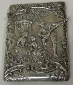 A fine novelty silver card case embossed with musical scene. Birmingham 1901.