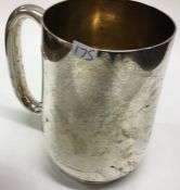 A heavy tapering silver mug. Sheffield. Approx. 382 grams. Est. £150 - £200.