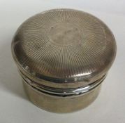 A large silver pill box with lift-off lid and engine turned decoration. Birmingham 1939.