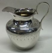 A good Victorian silver cream jug. London. By CB. Approx. 53 grams. Est. £30 - £40.