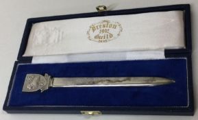 A cased 'Preston Guild' silver letter opener. London 1973. By WLD. Approx. 72 grams.