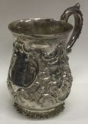GLASGOW: A chased Scottish silver christening mug embossed with flowers. 1851.
