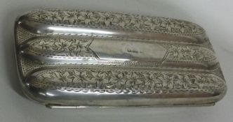 An engraved silver cigar case. Birmingham 1910. Approx. 98 grams. Est. £180 - £220.