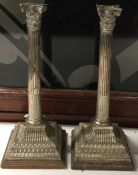 A large pair of 18th Century silver Corinthian column candlesticks. London 1758. By