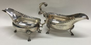 A heavy pair of George III silver sauceboats. Lond