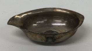 A silver pap boat with coin to centre. Approx. gra