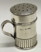 A small half fluted silver kitchen dredger. Approx 65 grams.