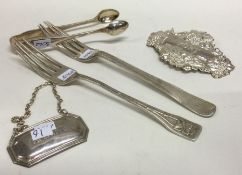 A box containing silver wine labels, cutlery etc. Approx. 105 grams. Est. £30 - £50.