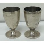 A novelty pair of silver egg cups. Birmingham 1920. By George Unite. Approx. 50 grams. Est. £40 - £6