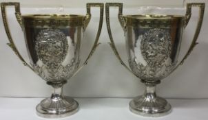 A very fine pair of Victorian silver Champagne buckets. London 1869. By Charles Frederick Hancock. A