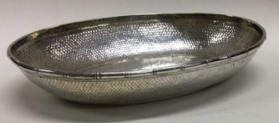 A fine quality oval Chinese silver sweet dish of textured form. Marked to base. Approx.