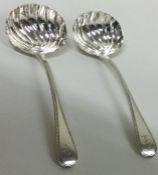 A matched pair of George III fluted bead pattern sauce ladles. London 1811.