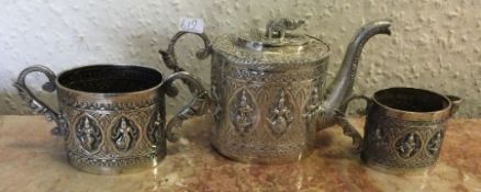 A heavy Indian silver three piece tea set. Approx.