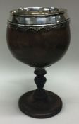 A large 18th Century silver mounted coconut cup. Approx. 426 grams. Est. £400 - £600.
