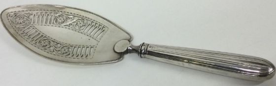 A large George III silver slice. London 1809. By WP. Approx. 152 grams. Est. £100 - £150.