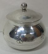 A rare arts and crafts silver box with lift-off lid. Birmingham 1909. By AE Jones.