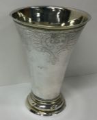 A large 18th Century silver beaker. Marked to base. Approx. 451 grams. Est. £800 - £1200.
