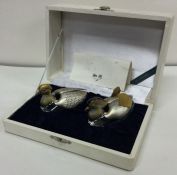 A pair of Japanese silver mounted glass salts in the form of birds. Approx. grams. Est.