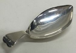 A Georgian silver caddy spoon. Birmingham. By WP. Approx. 9 grams. Est £30 - £40.