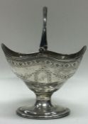 A fine quality George III silver swing handled basket. London 1787. By Charles Saffell.