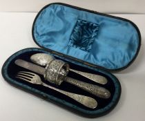 A fine quality silver four piece christening set in fitted box. London. Approx. 148 grams.