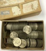 An old bank box containing a large selection of Churchill Crowns (coins)