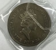 A Queen Mother's 90th Birthday Five Pound coin.