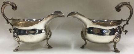 HESTER BATEMAN: A rare pair of 18th Century crested silver sauce boats.