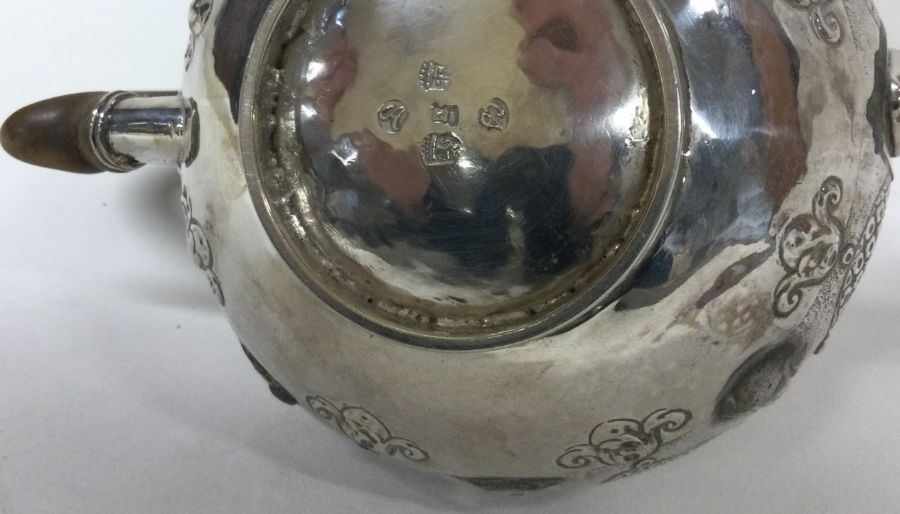 An early chased 18th Century Dutch silver teapot. Approx. 284 grams. - Image 3 of 3