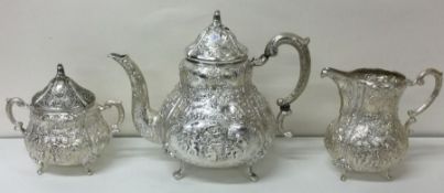 A very decorative early 20th Century German silver three piece tea set.