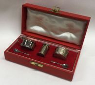 A cased silver three piece cruet set of typical form. London. Approx. 60 grams.