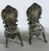 A novelty pair silver chairs bearing import marks. Approx. 28 grams.