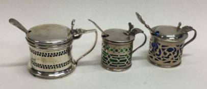 A group of three silver mustard pots. Various dates and makers. Approx. 85 grams.
