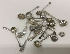 A large collection of silver salt spoons. Various dates and makers.